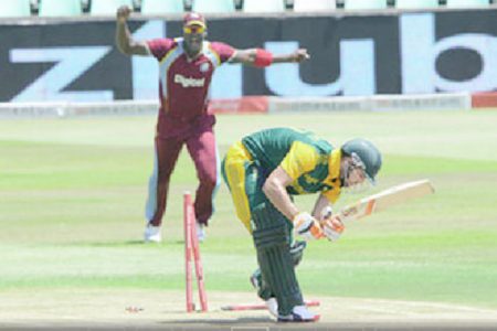 Rilee Rossouw of South Africa is bowled by Jerome Taylor of the West Indies during the first Momentum ODI at Sahara Stadium Kingsmead  yesterday in Durban, South Africa. (Photo by Lee Warren/Gallo Images)