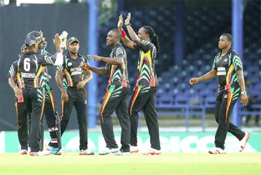 Royston Crandon and the other members of the Guyana Jaguars celebrate the dismissal of Shai Hope (not in picture) in their NAGICO Super50 fixture  at the Queen’s Park Oval yesterday. (Photo courtesy of WICB media)   