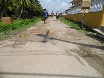  Pot hole-riddled Kuldeep Street (named after the NDC’s chairman) in Betsy Ground 