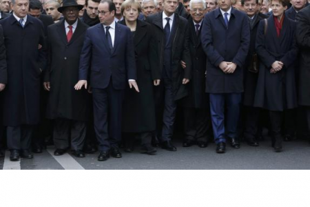 French President Francois Hollande is surrounded by Heads of state including (LtoR) Israel's Prime Minister Benjamin Netanyahu, Mali's President Ibrahim Boubacar Keita, Germany's Chancellor Angela Merkel, European Council President Donald Tusk, Palestinian President Mahmoud Abbas, Italy's Prime Minister Matteo Renzi and Switzerland's President Simonetta Sommaruga as they attend the solidarity march (Marche Republicaine) in the streets of Paris January 11, 2015.
Credit: Reuters/Philippe Wojazer