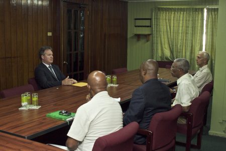 British High Commissioner Andrew Ayre (left) meeting with APNU leaders (APNU photo)