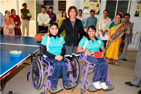 First Lady Deolatchmee Ramotar with two students during a visit to a school for the differently able in India (GINA photo)