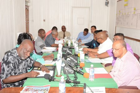The Guyana Elections Commission on Monday met a delegation from the PPP (right) to discuss elections preparations. (GECOM photo)