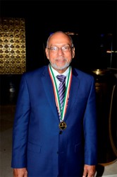 President Donald Ramotar with the Pravasi Bharatiya Samman Award (GINA photo)