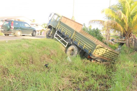 This truck found itself in the trench at Good Hope, East Coast Demerara today.