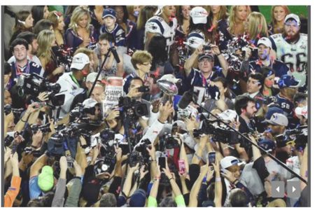 The New England Patriots celebrates with the Lombardi Trophy after beating the Seattle Seahawks in Super Bowl XLIX at University of Phoenix Stadium. Richard Mackson-USA TODAY Sports
