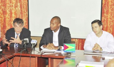 FIFA Head of Member Associations Primo Corvaro (left) addressing the media gathering at the Guyana Olympic House while GFF Normalization Committee Chairman Clinton Urling (centre) and CONCACAF Director of Legal Affairs Marco Leal look on.