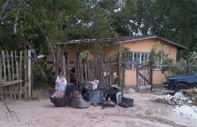 Solid waste placed at the front of a yard for pick up in One Mile on Sunday