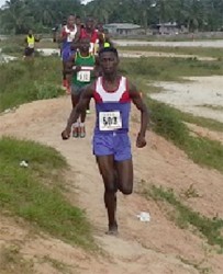 Early pace setter, Nathaniel Giddings leads the runners through the terrain in Linden. 