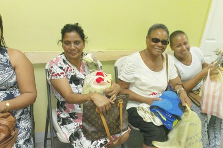 The happy faces of four cancer patients who received roses and gift hampers yesterday from Giftland OfficeMax. 