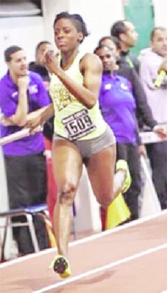 Brenessa Thompson is the ‘hunted’ as she strides from the competition in her relay team’s season leading run.