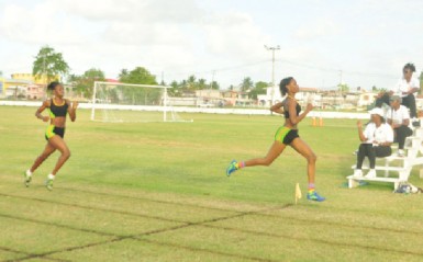 Running Brave Athletic Club’s Natricia Hooper powers across the finish line to win the 300m open female event. (Orlando Charles photo) 