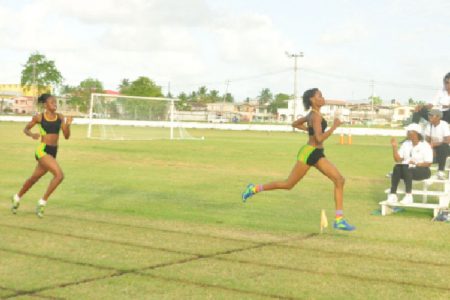 Running Brave Athletic Club’s Natricia Hooper powers across the finish line to win the 300m open female event. (Orlando Charles photo)
