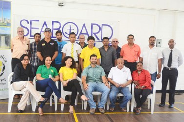 Fly Jamaica employees, the GMR&SC’s top brass and some of the motor racers competing in Jamaica pose for a photo following the media briefing yesterday. 