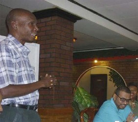 Godfrey Marshall (standing) was recently honoured for his long service to the Guyana Forestry CommissionAFC, St. John’s PTA protest at Education  Ministry for new school building 