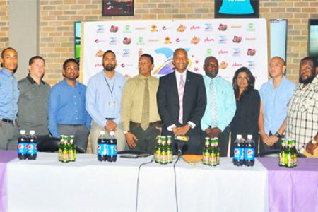 GFF Normalization Committee Chairman Clinton Urling (sixth from left) posing for a photo opportunity alongside other members of the launch party inclusive of Kashif and Shanghai Co-Directors Aubrey Major (fourth from right) and Kashif Mohammed (fifth from left) following the conclusion of the event’s unveiling 
