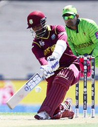 Wicketkeeper Denesh Rammdin, left and Lendl Simmons scored up tempo half centuries in the West Indies score of 310-6. (Photo WICB media) 