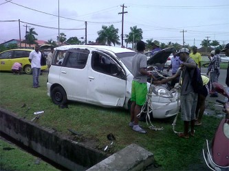 The car that Daniel Hinds was driving next to the culvert it crashed into. 