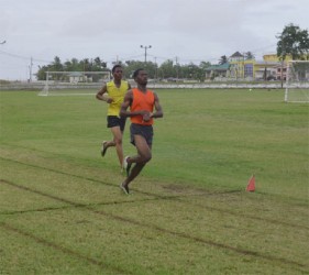 Cleveland Forde comfortably crosses the line to win the men’s 5000m event yesterday.   