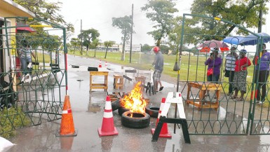 Students of the University of Guyana yesterday burnt tyres at the gates of the Turkeyen Campus, as they continue to demand a resumption of their classes. 