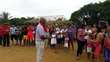 Works Minister Robeson Benn interacting with Region One residents. (Ministry of Public Works photo) 