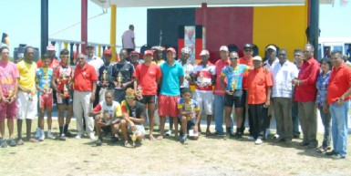 The prize winners of yesterday’s event pose with their spoils following the first leg of the Cheddi Jagan Memorial road race. (Orlando Charles photo)  