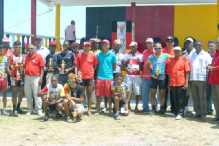 The prize winners of yesterday’s event pose with their spoils following the first leg of the Cheddi Jagan Memorial road race. (Orlando Charles photo)
