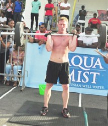  Team USA’s Joseph Rivera performing a clean exercise yesterday during the inaugural E-Networks CrossFit Games. (Orlando Charles photo)