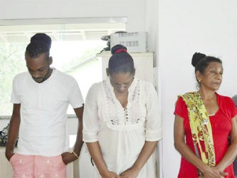 From left to right: Joseph Adams, 25, Fabiola Adams, 28, and their mother, Khumwatte Narine Adams, 49 who were charged with trafficking in narcotics and being accessories to drug trafficking (Photo: Emily Costa / Globo 1)