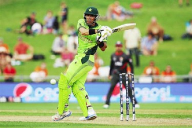 Pakistan’s Misbah ul Haq pulls a delivery for four during his  half century yesterday.