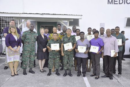 Mary Kratz (third from left in front row) is seen with GDF Medical Corps staff who were trained and others. (GDF photo)