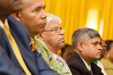 Justice For All Party Leader CN Sharma (centre), his son Jaipaul Sharma (right) and Dr George Norton (third from right) at the formal launch of the APNU+AFC alliance yesterday at the Guyana Pegasus. (APNU+AFC photo). 