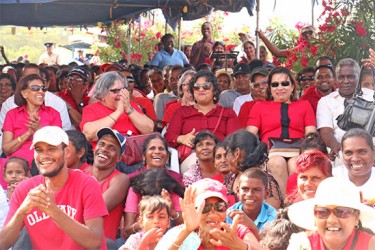 Enthused Cabinet members and others can be seen in this photo at the commemoration ceremony for Cheddi and Janet Jagan at Babu John, Port Mourant. 