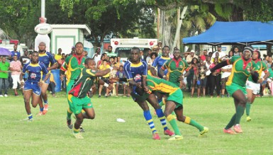 Rugby action on Saturday at the National Park during Guyana’s 48-22 rout of Barbados. (Orlando Charles photo)  