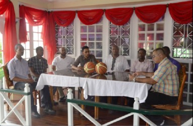 GABF President Nigel Hinds (centre) flanked by members of the Bermuda and Guyana units inclusive of Bermuda’s Husayn Symonds (left), Kevin Stephens (2nd left), Jeron Haley (3rd left) and Chris Crumpler (4th  left) and Guyana’s Darcel Harris (3rd right) and Junior Hercules (2nd  right) during the press briefing yesterday.