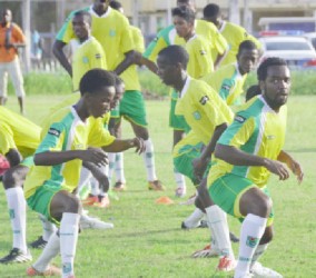 Members of the Golden Jaguars local squad going through their warm-up paces during the commencement of their first training session at the Eve Leary ground yesterday.   