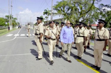 President Donald Ramotar inspecting the guard of honour prior to the opening of the Annual Police Officers Conference (GINA photo) 