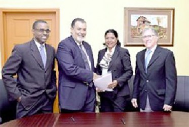 From left to right .J. Tyrone Marcus – Legal Officer, CANOC Broadcasting Inc., Larry Romany – CEO , CANOC Broadcasting Inc., Shida Bolai – President, Caribbean Broadcasting Union, and Tony Inglefield – Managing Director. Inglefield /Ogilvy And Math  