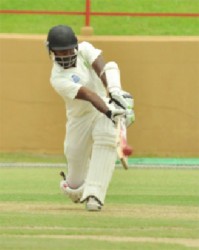 Rajendra Chandrika turns a delivery to leg during his innings of 51 yesterday. (Orlando Charles photo)