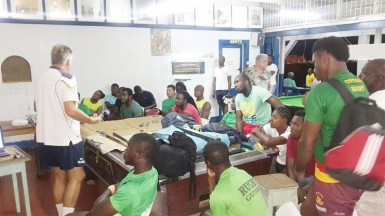 The national rugby team listening intently to Technical Director, Angus Thomson during film session on Thursday. 