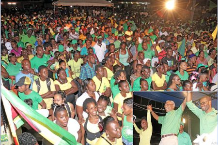 United we stand: A section of the crowd of thousands in attendance at the launch of the APNU+AFC coalition’s elections campaign in Linden last night. Inset is coalition leader David Granger (centre) holding hands with APNU regional executive Vanessa Kissoon and Region 10 Chairman Sharma Solomon to the thunderous applause and cheers of the crowd. (Photos by Arian Browne)