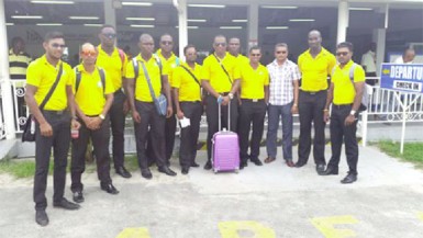 The 2014/15 Regional Four day winners Guyana Jaguars pose with CGI Executive Anand Sanasie (second for far right) 