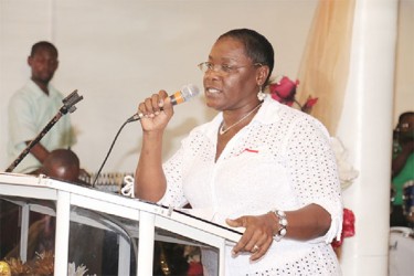 A church member singing music at Crum-Ewing’s funeral.    