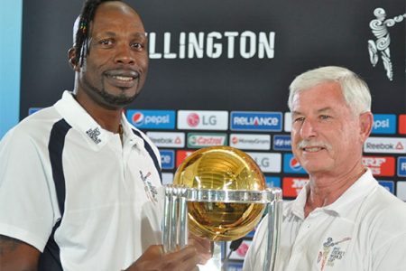 West Indies fast bowling legend Sir Curtly Ambrose and New Zealand fast bowling legend Sir Richard Hadlee hold the ICC Cricket World Cup trophy after a media conference at the Basin Reserve on March 19. WICB Media Photo/Philip Spooner