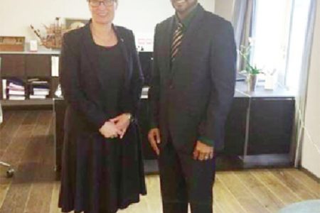 Norwegian Minister of Climate and Environment Tine Sundtoft with Minister of Natural Resources Robert Persaud (Ministry of Natural Resources photo)
