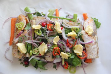 Fish en Papillote getting ready for the oven  (Photo by Cynthia Nelson) 