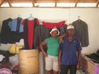 Aunty Jackie and Uncle Selman in their tailor shop at the front of their home. 