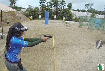 Vidushi Persaud on her way to her second place finish in the Ladies category pistol shoot in Suriname last year. 