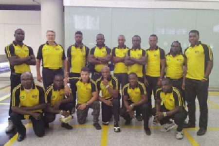 Guyana’s rugby team pose for photos shortly after arriving in Hong Kong