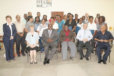 Participants and facilitators of the Intensive Coaching Program along with Chief Education Officer Olato Sam (seated second at left) and Coordinator of the Guyana Improving Teacher Education Project Tota Mangar (seated at right).  